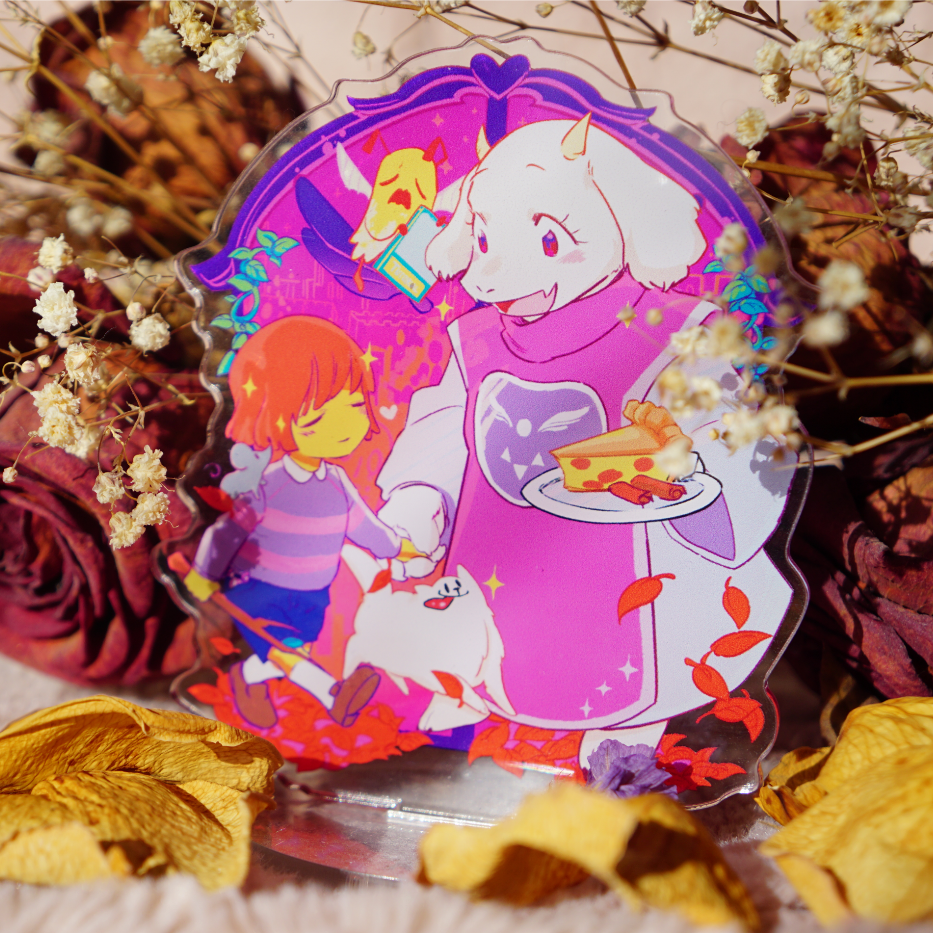 merchandise photograph of an acrylic standee of Toriel, Frisk, and the Annoying Dog, standing in front of the door to the Ruins.